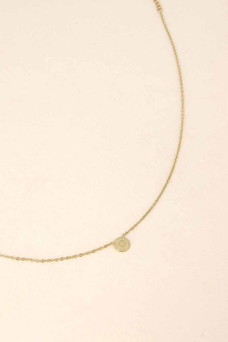 Collier rond motif soleil